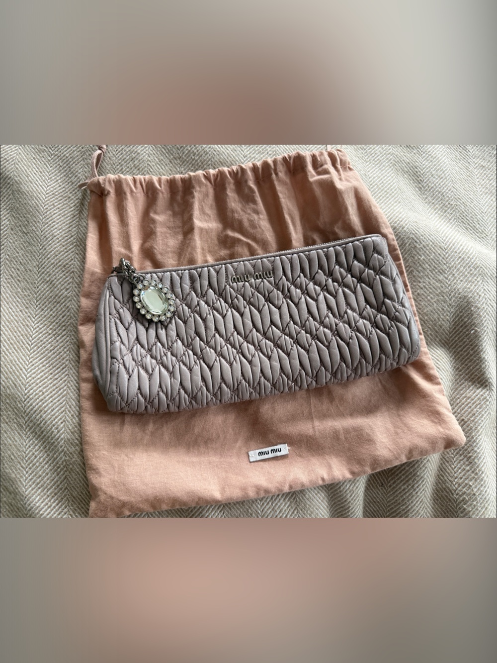 Miu Miu Quilted Leather Zip clutch in Taupe with Jeweled Charm